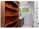 Cozy bathroom features a classic wood cabinet, stylish vanity, and tiled shower at 2219 W Catalina Dr, Phoenix, AZ 85015