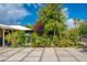 Home featuring desert landscaping, paver driveway and vibrant flowers at 2219 W Catalina Dr, Phoenix, AZ 85015
