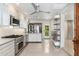 Modern kitchen featuring stainless steel appliances, custom cabinets, and a sleek, contemporary design at 2219 W Catalina Dr, Phoenix, AZ 85015