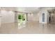 Open concept living room featuring recessed lighting, tile floors, and sliding glass doors at 2219 W Catalina Dr, Phoenix, AZ 85015