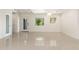 Bright living room with tile floors, recessed lighting, and large windows at 2219 W Catalina Dr, Phoenix, AZ 85015