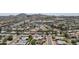 Expansive aerial view of a charming neighborhood with mountain views in the distance at 2346 E Sylvia St, Phoenix, AZ 85022
