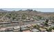 Overview of neighborhood featuring mature trees, swimming pool, and easy access to a main thoroughfare at 2346 E Sylvia St, Phoenix, AZ 85022