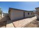 Backyard with desert landscaping and patio leading to house at 2346 E Sylvia St, Phoenix, AZ 85022