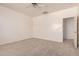 Neutral Primary bedroom featuring carpet and ceiling fan at 44188 W Cydnee Dr, Maricopa, AZ 85138