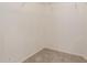 An empty walk-in closet features carpet floors and built-in wire shelving at 44188 W Cydnee Dr, Maricopa, AZ 85138