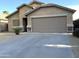 Charming single-Gathering home with a neutral-colored exterior, two-car garage, and low-maintenance front yard at 4582 E Superior Rd, Queen Creek, AZ 85143