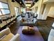 Inviting lounge area with comfortable seating, bar, and a kitchen for residents at 535 W Thomas Rd # 407, Phoenix, AZ 85013