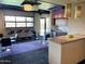 Stylish community lounge area featuring a kitchenette, bar stools, and cozy seating at 535 W Thomas Rd # 407, Phoenix, AZ 85013