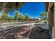 Charming neighborhood street with sidewalks, landscaping, and well-maintained homes and trees at 10945 E Storia Ave, Mesa, AZ 85212