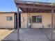 Back patio with brick pavers and a covered overhang at 112 S 28Th Dr, Phoenix, AZ 85009