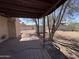 Spacious backyard featuring a covered patio and storage shed, perfect for outdoor living and storage at 112 S 28Th Dr, Phoenix, AZ 85009