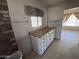 Kitchen area with counter space, and natural light at 112 S 28Th Dr, Phoenix, AZ 85009