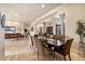 Elegant dining room showcasing tile flooring and contemporary furniture at 11448 E Blue Sky Dr, Scottsdale, AZ 85262