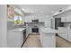 Kitchen featuring granite countertops, stainless steel appliances and island with seating at 119 S Monterey St, Gilbert, AZ 85233