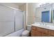Clean bathroom featuring a tub and shower combination and a vanity with sink at 13261 N 110Th Ave, Sun City, AZ 85351
