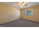 Bedroom with a ceiling fan and a window with natural light at 13261 N 110Th Ave, Sun City, AZ 85351