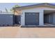Exterior image of the home featuring a garage and covered carport, offering ample parking space at 13261 N 110Th Ave, Sun City, AZ 85351