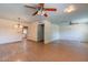 Bright, open-concept living area with tile and laminate flooring at 13261 N 110Th Ave, Sun City, AZ 85351