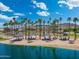 Beautiful community park featuring sandy beach, ramadas, and palm trees at 15663 S 183Rd Dr, Goodyear, AZ 85338