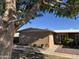 Charming single-story home featuring a well-manicured yard and mature shade tree at 17823 N 99Th Dr, Sun City, AZ 85373
