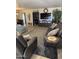 Cozy living room with modern furniture, large television, and decorative decor for entertaining guests and relaxing at 17823 N 99Th Dr, Sun City, AZ 85373