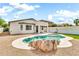Beautiful backyard featuring a private pool and patio at 18286 La Posada Ct, Gold Canyon, AZ 85118