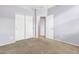 Bedroom with carpet, neutral paint, and closet at 18286 La Posada Ct, Gold Canyon, AZ 85118