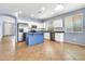 Spacious kitchen featuring stainless steel appliances, a center island, and ample cabinet space at 18286 La Posada Ct, Gold Canyon, AZ 85118