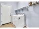 Laundry room features white washer and dryer at 18286 La Posada Ct, Gold Canyon, AZ 85118