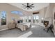 Luxurious main bedroom featuring a fireplace, neutral decor, views and private outdoor access at 18401 N 14Th St, Phoenix, AZ 85022