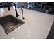 Elegant kitchen sink set in a luxurious quartz countertop, perfect for modern living at 20210 N Wagner Wash Dr, Buckeye, AZ 85396