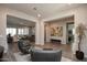 Stylish living room showcasing tile floors and a seating area at 20210 N Wagner Wash Dr, Buckeye, AZ 85396