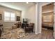 Cozy living room with comfortable seating and a decorative rug, perfect for relaxation at 20210 N Wagner Wash Dr, Buckeye, AZ 85396