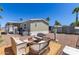 Backyard featuring a sitting area, gravel landscaping and a view of the home's exterior at 2060 N Center St # 138, Mesa, AZ 85201