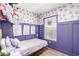 Charming bedroom with playful decor, soft colors and unicorn themed wall decorations at 2060 N Center St # 138, Mesa, AZ 85201