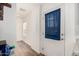 Bright entryway featuring wood-look floors, a window and access to more of the home at 2060 N Center St # 138, Mesa, AZ 85201