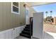 Exterior of home with covered steps and back entrance at 2060 N Center St # 138, Mesa, AZ 85201