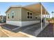 Charming single-story home with a covered carport offering shaded parking at 2060 N Center St # 138, Mesa, AZ 85201