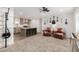 Open concept living area featuring a kitchen island and comfortable seating area at 2060 N Center St # 138, Mesa, AZ 85201