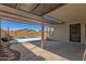 View of the backyard patio with a covered area, BBQ grill and a view of the swimming pool at 2122 W Alta Vista Rd, Phoenix, AZ 85041
