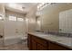 This is a simple bathroom with a tub and marble sink vanity at 2122 W Alta Vista Rd, Phoenix, AZ 85041