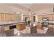 Spacious kitchen with stainless steel appliances, kitchen island, and ample cabinet space at 21373 N 94Th Ave, Peoria, AZ 85382