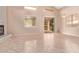 Inviting living room with a fireplace and sliding glass door at 21373 N 94Th Ave, Peoria, AZ 85382