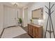 Welcoming entryway with stylish decor, light neutral walls, and hardwood flooring at 21918 E Maya Rd, Queen Creek, AZ 85142