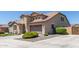 Inviting home featuring well-kept landscaping and ample parking space at 21918 E Maya Rd, Queen Creek, AZ 85142