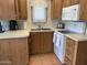 Well-equipped kitchen featuring modern appliances, ample counter space, and a functional design at 2192 W Taos Ave, Apache Junction, AZ 85119