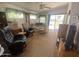 Comfortable living room with cozy seating, natural light, and sliding glass doors at 2192 W Taos Ave, Apache Junction, AZ 85119
