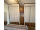 Comfortable bedroom with built-in storage, offering ample space and organizational solutions at 2192 W Taos Ave, Apache Junction, AZ 85119