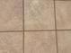 Close up on the durable, easy-to-maintain neutral tile flooring at 2192 W Taos Ave, Apache Junction, AZ 85119